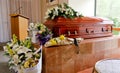 Closeup shot of a colorful casket in a hearse or chapel before funeral or burial at cemetery Royalty Free Stock Photo