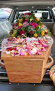 Colorful casket in a hearse or chapel before funeral or burial at cemetery