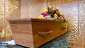 Colorful casket in a hearse or chapel before funeral or burial at cemetery