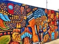 Closeup shot of colorful Mayan mural art in the downtown area of Mexico