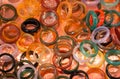 Closeup shot of colorful plastic rings on the table under the lights Royalty Free Stock Photo