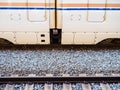 Closeup shot of a colorful train near the tracks Royalty Free Stock Photo