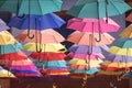 Closeup shot of colorful umbrellas hanging from the ceiling