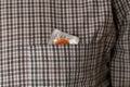 Closeup shot of a condom in a pocket-concept of protection against sexually transmitted diseases Royalty Free Stock Photo