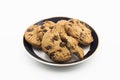 Closeup shot of cookies in a small plate isolated on a white background Royalty Free Stock Photo