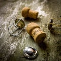 Closeup shot of corks of champagne on a wooden surface