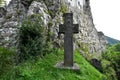 Closeup shot of a cross outside of Bran Castle, Romania