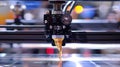 A closeup shot of the 3D printer nozzle showing the precise movements and placement of the material being extruded Royalty Free Stock Photo