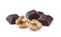Closeup shot of  dark chocolate with walnuts on white background Royalty Free Stock Photo
