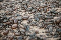 Closeup shot of the dark pebbles at the beach in Lanzarote, Spain