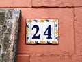 Closeup shot of a decorated house number Royalty Free Stock Photo