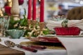 Closeup shot of decorative Christmas dinner set up within a table Royalty Free Stock Photo