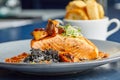 Closeup shot of a delicious salmon with vegetable sidedish