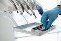 Closeup Shot Of Dentists Hand In Blue Glove Taking Sterile Stomatological Tools Royalty Free Stock Photo