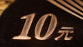 Closeup shot of the detail of number 10 on Chinese yuan coin