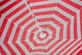 Closeup shot of details on a striped red white beach umbrella Royalty Free Stock Photo