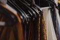 Closeup shot of different clothes hanging in the store Royalty Free Stock Photo