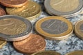 Closeup shot of different euro coins on a table Royalty Free Stock Photo