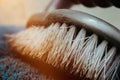 Closeup shot of a dirty wooden broom head