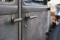 Closeup shot of door handle in an old vintage car Royalty Free Stock Photo