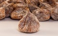 Closeup shot of a dried fig with others in the background Royalty Free Stock Photo