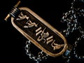 Closeup shot of the Egyptian Cartouche amulet on a black background