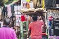 Closeup shot of an Egyptian Man caring many breads on his head walking in the market