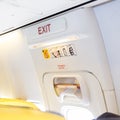 Closeup shot of emergency exit door in airplane