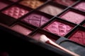 Closeup shot of eyeshadow, cosmetics, makeup. Professional eyeshadow palette macro shot. Eye shadow collection, make up theme. AI