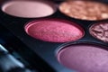 Closeup shot of eyeshadow, cosmetics, makeup. Professional eyeshadow palette macro shot. Eye shadow collection, make up theme. AI Royalty Free Stock Photo