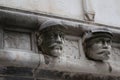 Closeup shot of famous faces on the side portal of Sibenik cathedral