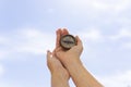 Closeup shot of a female hand holding an old compass Royalty Free Stock Photo