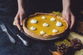 Female hands placing pie on counter Royalty Free Stock Photo