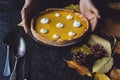 Female hands placing pie on counter Royalty Free Stock Photo