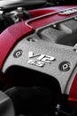 Closeup shot of the Ferrari 812 Superfast V12 6.5 Liter engine cover