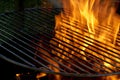 Closeup shot of the fire flames under the barbeque grill set Royalty Free Stock Photo