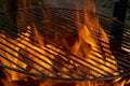 Closeup shot of the fire flames under the barbeque grill set Royalty Free Stock Photo