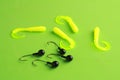 Closeup shot of fishing lures on a green surface Royalty Free Stock Photo