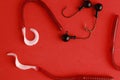 Closeup shot of fishing lures on a red surface Royalty Free Stock Photo