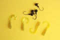 Closeup shot of fishing lures on a yellow surface Royalty Free Stock Photo