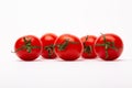 Closeup shot of five cherry tomatoes on a white background - perfect for a food blog Royalty Free Stock Photo