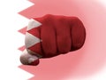Closeup shot of a flag of Bahrain painted on male fist