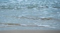 Closeup shot of the foamy water at the Shek O Beach, Hong Kong Royalty Free Stock Photo