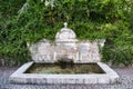 Closeup shot of a fountain with four pipes in the Socayo park in Valladolid in Spain