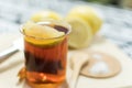 Closeup shot of a fresh cup of tea with a slice of lemon Royalty Free Stock Photo