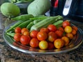 Closeup shot of fresh homegrown cherry tomatoes and Okra