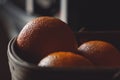 Closeup shot of fresh ripe oranges in a basket Royalty Free Stock Photo