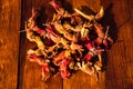 Closeup shot of fresh ripe red hazelnuts on wooden table Royalty Free Stock Photo