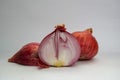 Closeup shot of a fresh shallot with a slice