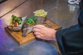 Closeup shot of fresh tilapia being served with French fries and a salad Royalty Free Stock Photo